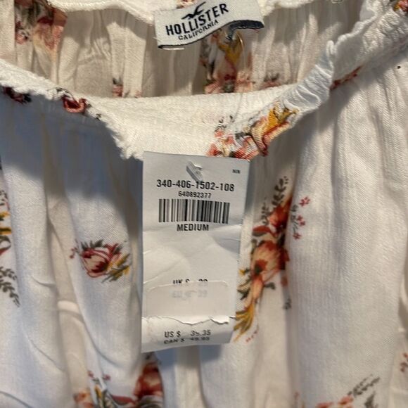 Hollister off the shoulder top! Cream w/orange floral pattern Size Medium NWT - Picture 5 of 5